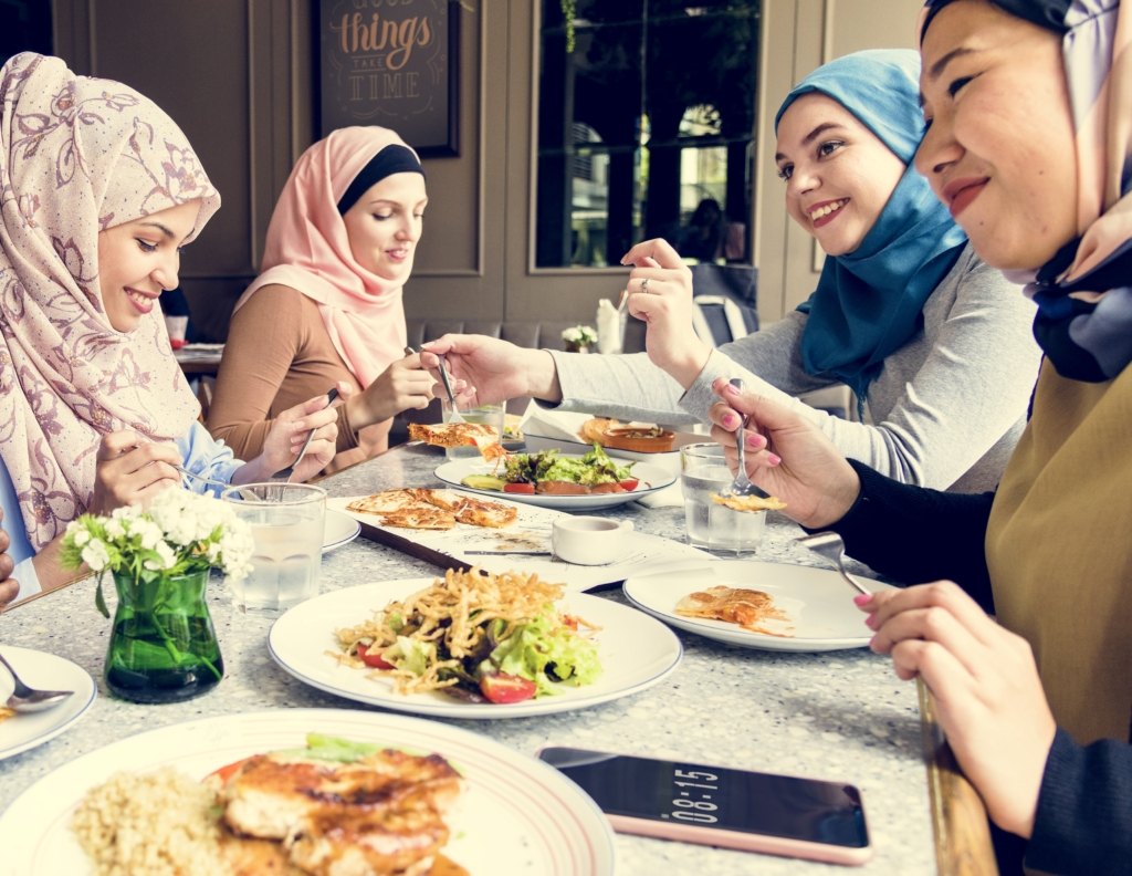 islamic women friends dining together with happine 2022 12 16 00 26 56 utc
